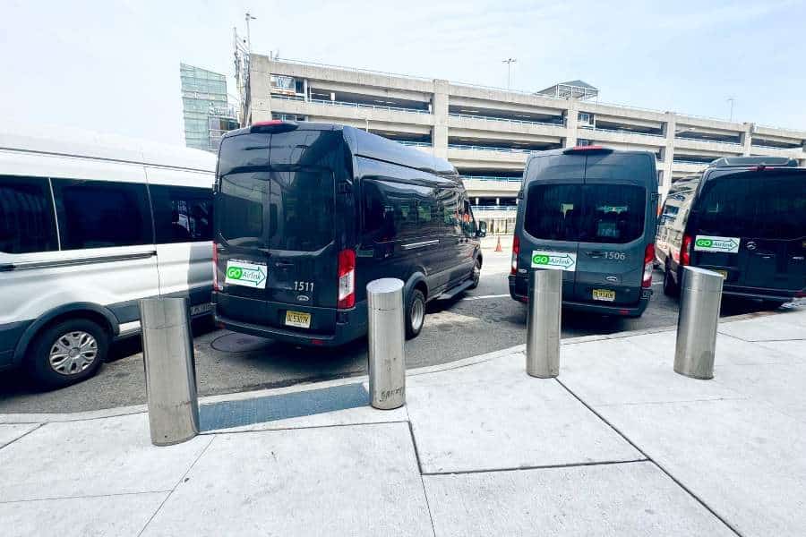 Airport Shuttles Curbside at the Terminal
